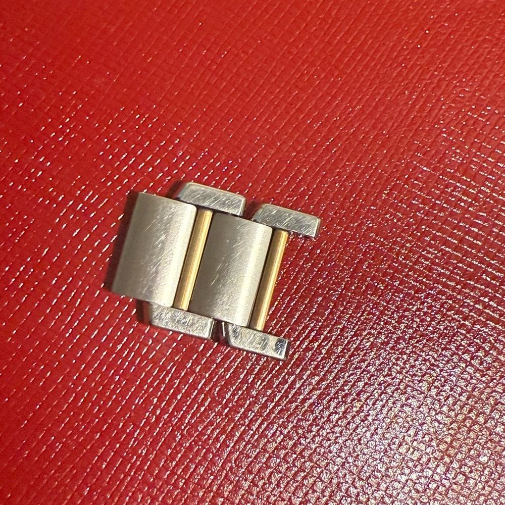 Silver and Gold Watch Link
